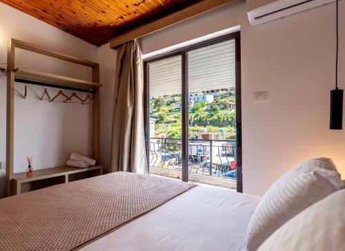 Katil atau katil-katil dalam bilik di Sunny Side B&B