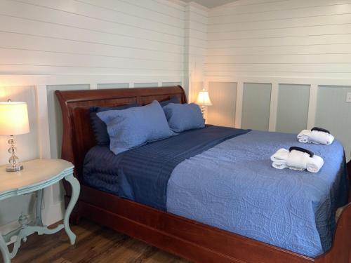 a bedroom with a bed with towels on it at Beaufort SC New Renovation, Close to Parris Island, Historic Downtown, Beautiful Beaches, Sleeps 6 in Beaufort