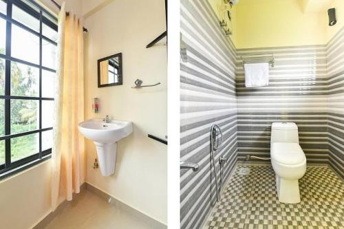 a bathroom with a toilet and a sink at Hotel O VR Lodge in Pathanāmthitta