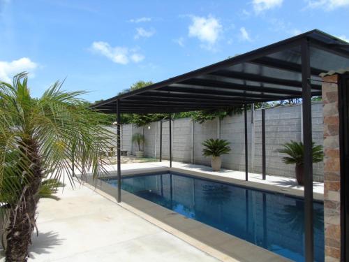 Piscina a Conchal Maquito House o a prop