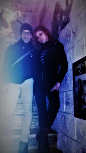 two people standing next to each other in a room at Anahuaska Art - Suites Temáticas in Panzares