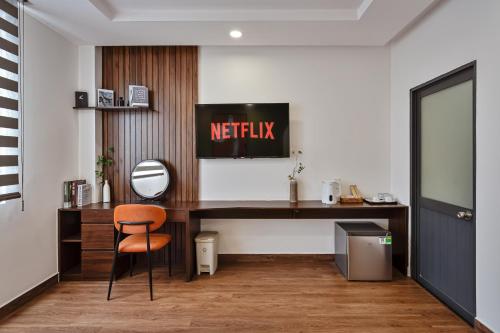 an office with a desk and a chair at V Living - Downtown Saigon Stay with Free Laundry in Ho Chi Minh City