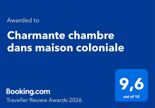 a blue sign with the textarmaarmaarma dams mission collaborative at Charmante chambre dans maison coloniale in Noumea
