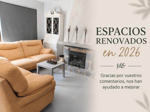 a living room with a couch and a fireplace at Villa Cayetana in Jávea