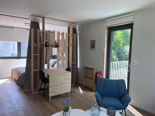a room with a bed and a desk and a chair at Secret garden 3 in Mellehoek