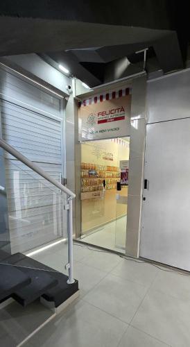 a store front with a glass door in a store at Residencial Felicita in Barueri