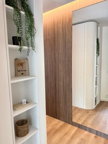 a room with a closet with a mirror at Apartmán Milujto, Pálava in Pavlov
