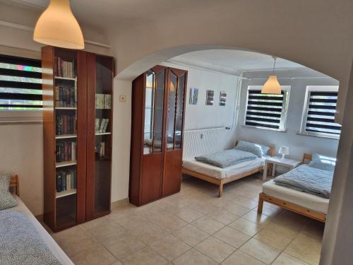 a living room with two beds and a couch at Ferienwohnung Anja in Sonneberg