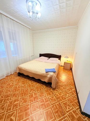 a bedroom with a bed in a room at Одноместный номер на ключ в хостеле Single Hostel Room in Chişinău