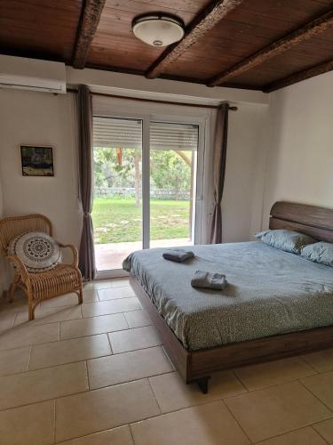 Llit o llits en una habitació de Villa Damis - Levanda