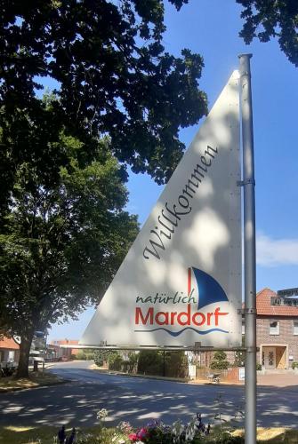 aangularangular sign for a marriott sign on a street at Birken Loft am Meer in Neustadt am Rübenberge