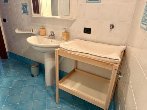 a small bathroom with a sink and a sink at Maison Champriond in Rif