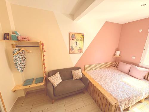 Llit o llits en una habitació de La petite Escapade