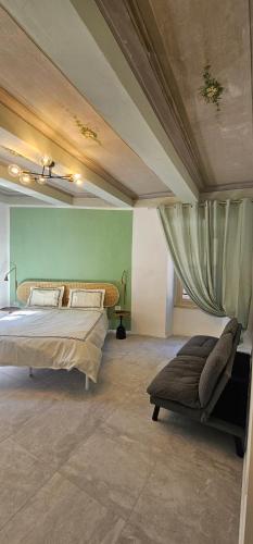 a bedroom with two beds and a curtain at HOUSE Sant'Angelo in Acquapendente