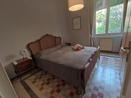 a bedroom with a large bed in a room at Il Veliero in Bonassola