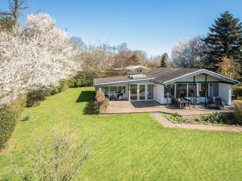 a home with a large yard with a house at 6 person holiday home in Sydals-By Traum in Sønderby