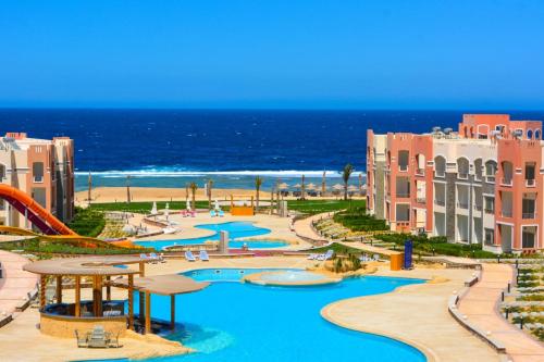 a view of a resort with a water park at شاليه 2 غرفه in Marsa Alam