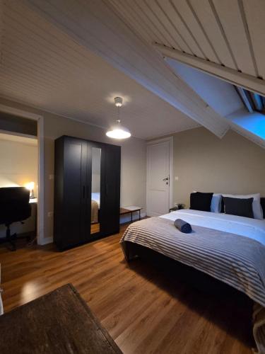 a bedroom with a large bed in a room at Peaceful Pad in Brussels