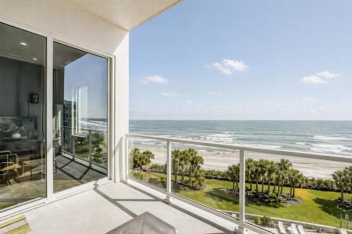 a balcony with a view of the ocean at Diamond Beach in Galveston
