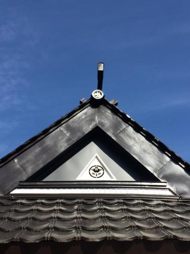 a close up of the roof of a house at Goemon Kyoto Japan in Kyoto
