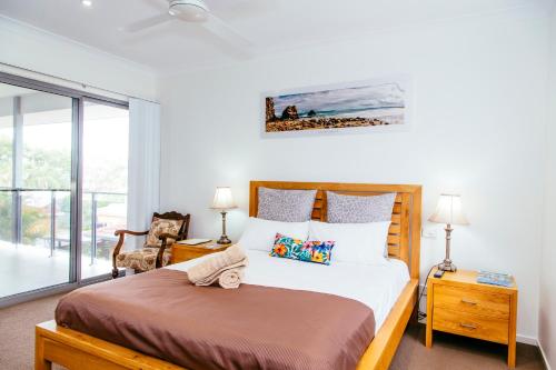 เตียงในห้องที่ Coffs Jetty BnB