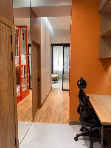 an office with a desk and a chair in a room at Apartment prime residence in Ak-Tyube