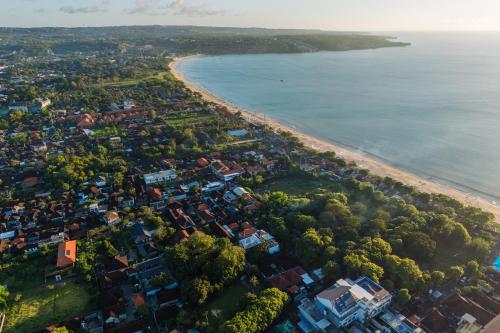 an aerial view of a city and a beach at Tropical Villas Complex in Jimbaran