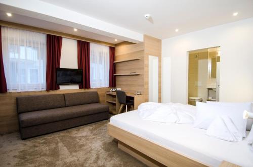 Ein Bett oder Betten in einem Zimmer der Unterkunft Klaushof