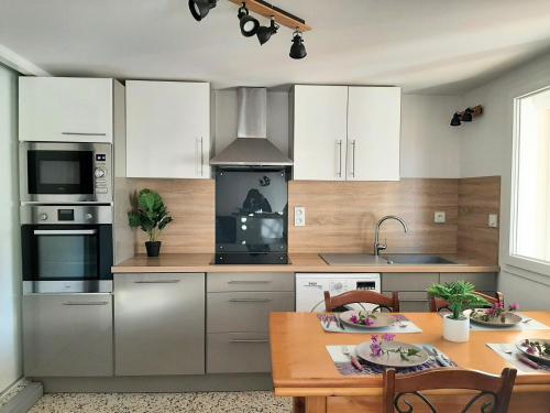 Charmant logement plain pied climatisé, 100 m de plage