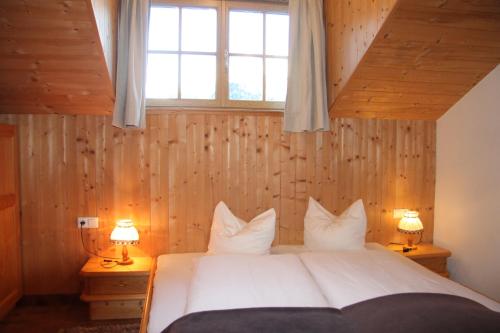 Ένα ή περισσότερα κρεβάτια σε δωμάτιο στο Apartmenthaus Innerkratzerhof
