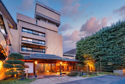 a building with a building in front of it at Club Wyndham Chikumakan Nagano in Chikuma