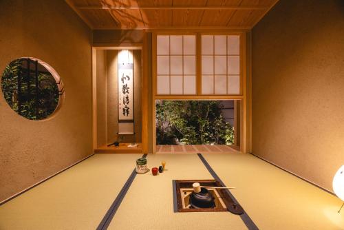 a room with a picture on the floor with a window at Shinjuku Washington Hotel in Tokyo