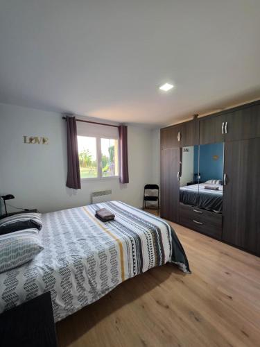 Llit o llits en una habitació de Maison familiale
