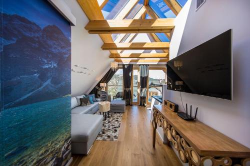 Televízia a/alebo spoločenská miestnosť v ubytovaní udanypobyt Apartament Studio Lovely SPA