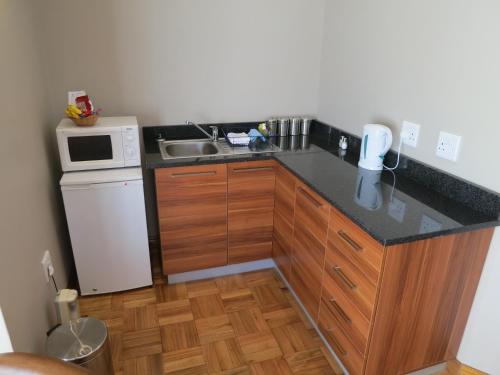 Η κουζίνα ή μικρή κουζίνα στο Dias Guest House