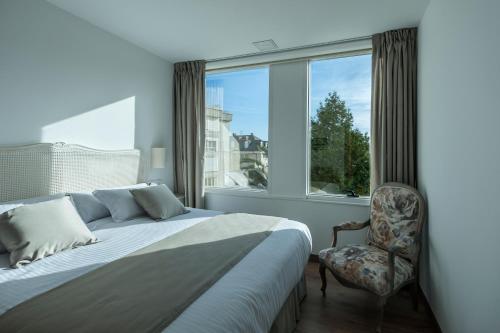 Posteľ alebo postele v izbe v ubytovaní Suite Home Sardinero