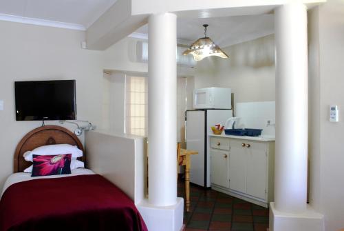 Η κουζίνα ή μικρή κουζίνα στο Dias Guest House