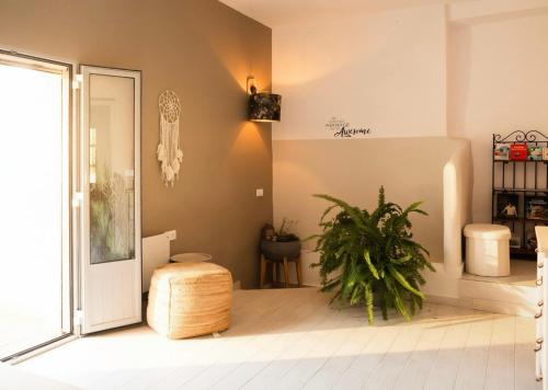 a room with a door and a plant at Boutique Cortijo Meliora in Cantoria
