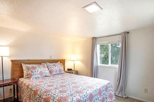 a bedroom with a bed and a window at You Won't Be Crabby After Staying Here in Westport