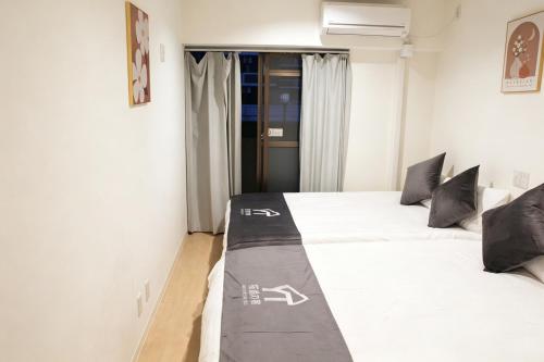大阪市中心双床房 日本桥地铁站徒步2分钟 道顿堀 心斋桥 黑门市场 难波动漫街各大繁华商业街徒步可达 高津大标