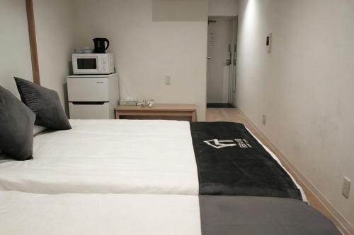 大阪市中心双床房 日本桥地铁站徒步2分钟 道顿堀 心斋桥 黑门市场 难波动漫街各大繁华商业街徒步可达 高津大标