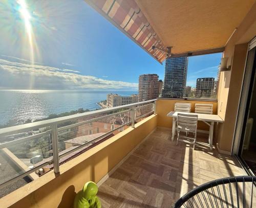 a balcony of a condo with a view of the ocean at MONACO - FANTASTIC Apartment and Sea View -1 bedroom 80m2 in Roquebrune-Cap-Martin