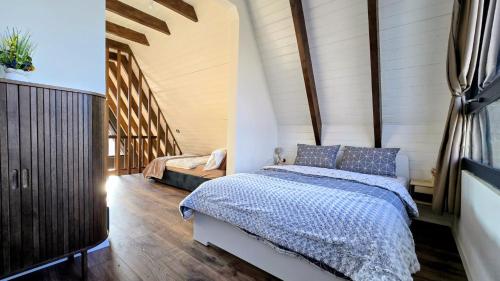 a bedroom with a bed in a room at Meziad-Panorama in Meziad