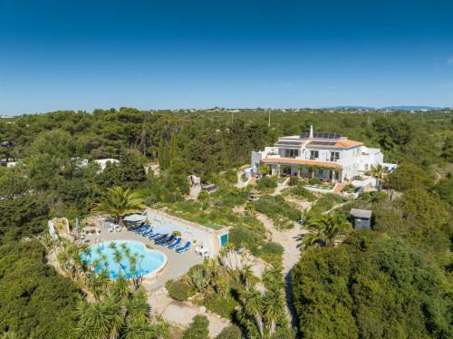 an aerial view of a resort with a swimming pool at 233 Casa Galo Verde Apartments in Porches