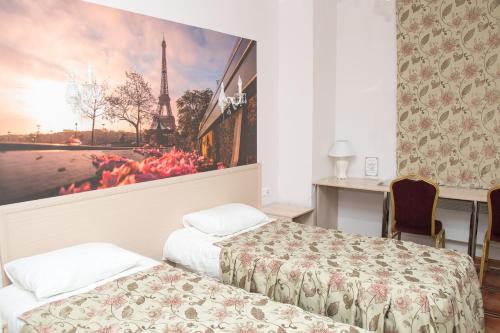 Postel nebo postele na pokoji v ubytování Hotel Argo
