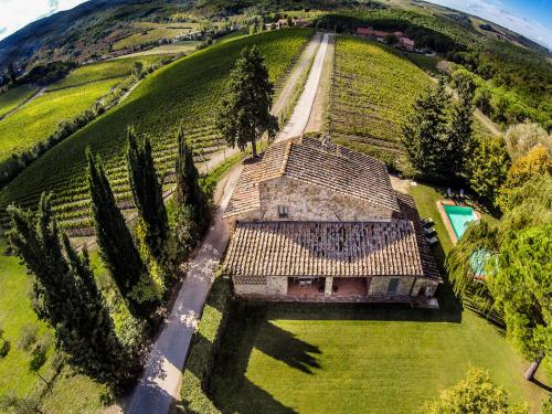 an aerial view of a house on a hill at Riant Relais de Charme in Greve in Chianti