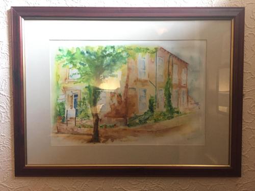 a painting of a street with buildings at Cornerways Guest House in Carlisle