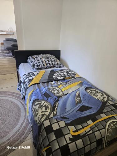 En eller flere senge i et værelse på Logement moderne équipé