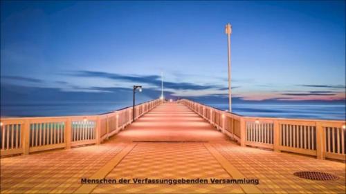 a boardwalk leading to the ocean on a pier at knär in Erkner