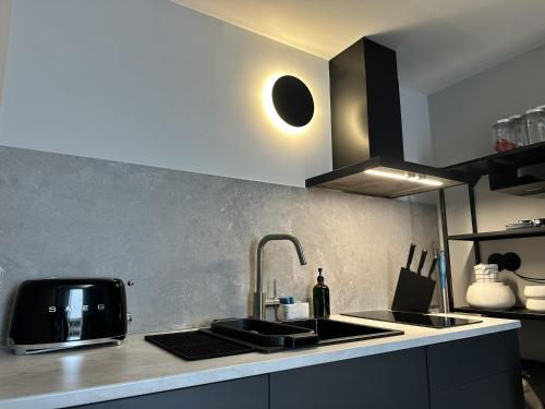 Foto Apartamento acolhedor no centro da cidade, com pátio privado. 4